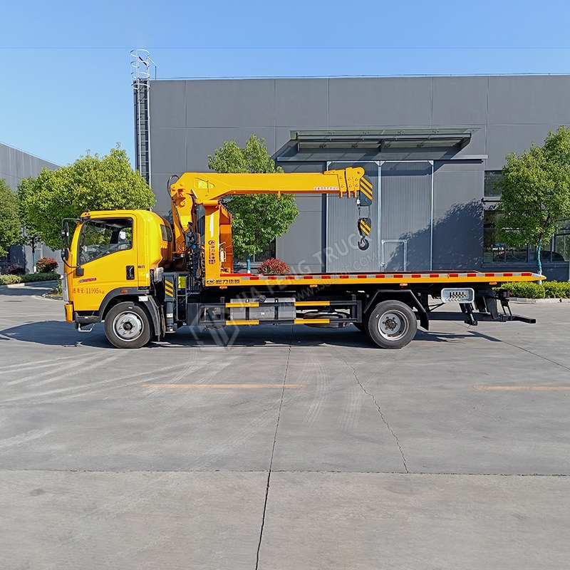 Sinotruk Howo Tow Truck with 2 cars towed