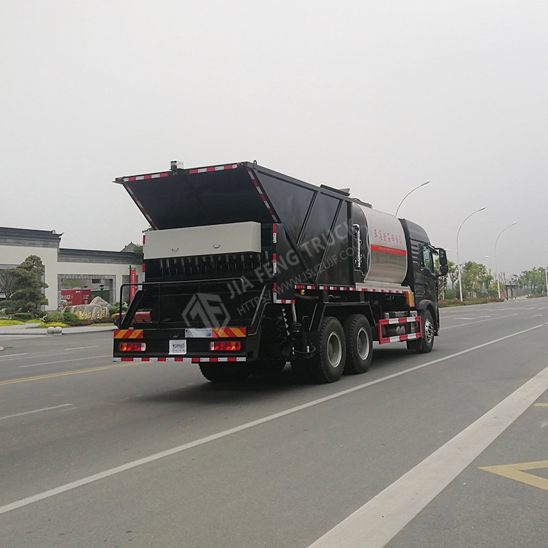 Sinotruk HOWO 6x4 Synchronized Stone Chip Sealing Truck
